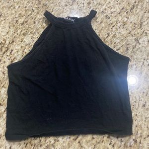 Black tank crop top, size large but fits well on a medium!